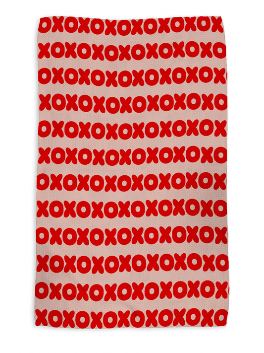 XOXO kitchen tea towel, flat lay